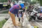 Petugas-DLH-Kota-Serang-mengambil-sampel.jpg