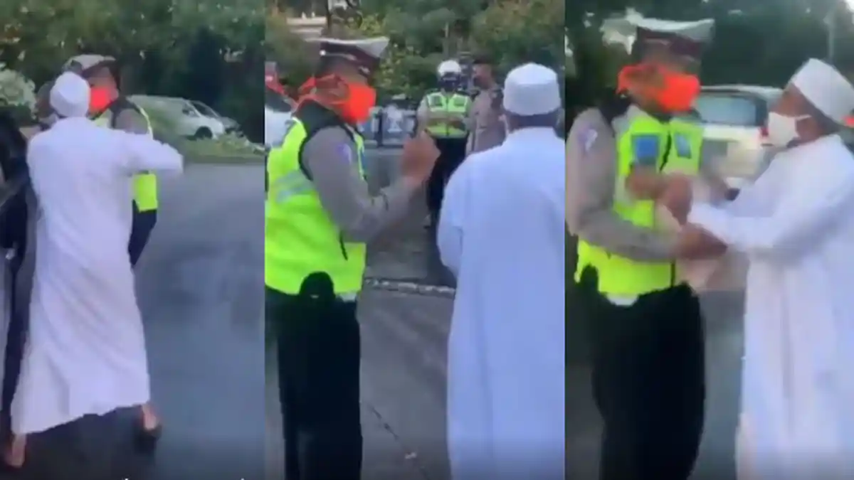 Viral Video Pria Jubah Putih Adu Mulut Dengan Aparat, Diduga Langgar Aturan PSBB