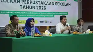 Nazaruddin-MLIS-PhD-saat-membuka-Bimbingan-Teknis-Pengelolaan-Perpustakaan-2026.jpg