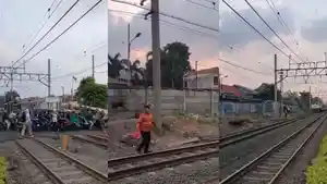 Viral-Puluhan-Pemotor-Nekat-Terobos-Rel-Kereta-Api-Meski-Sirine-Sudah-Dinyalakan.jpg