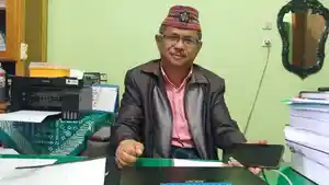 KEPSEK-SMAN-1-LANGKE-REMBONG.jpg