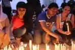 Aksi Lilin dan Doa Bersama untuk Satinah
