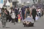 Potret Warga Gaza Kibarkan Bendera Putih