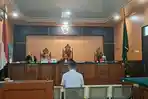terdakwa-pembobl-bank-kalteng.jpg