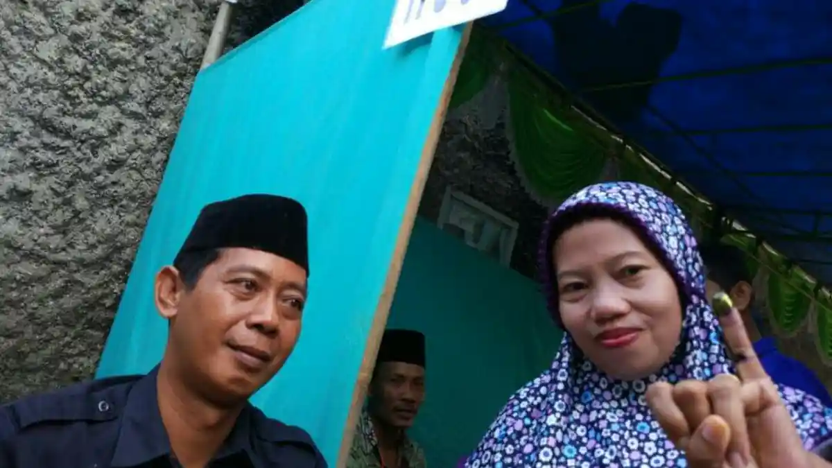 Foto: Antusiasme Warga Mencoblos di Pilkada DKI Putaran Kedua