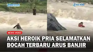 Aksi-Heroik-Seorang-Pria-Selamatkan-Bocah-yang-Terbawa-Arus-Banjir.jpg