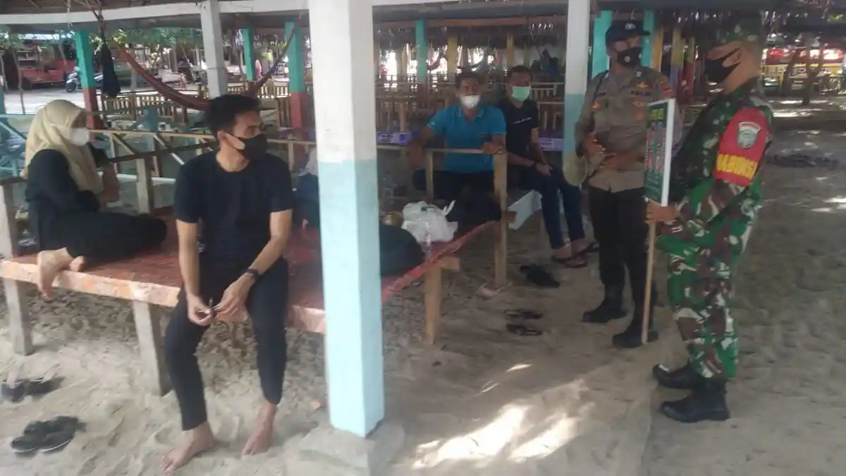 Polisi Imbau Pengunjung Lokasi Wisata Pasir Putih Patuhi Protokol Kesehatan