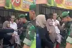 Ibu-ibu-dari-korban-tragedi-kanjuruhan-dihadang-TNI_.jpg