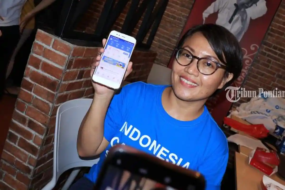 FOTO: Restituta Ajeng PR Manager Dana Tunjukkan Platform Pembayaran Digital Dana di KFC Ayani - dompet-dana7.jpg