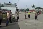 Polres Pelabuhan Belawan Lakukan Pengamanan dan Pengawalan Buruh Peringati Hari Buruh Internasional
