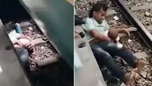 Viral-aksi-seorang-ayah-di-Bangladesh-lompat-dan-rebahan-di-rel-demi-melindungi-anaknya-_.jpg